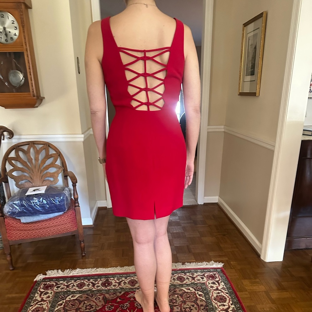 Andrea Polizzi size 8, backless/strapped red cocktail dress. Size 8. Worn once.
